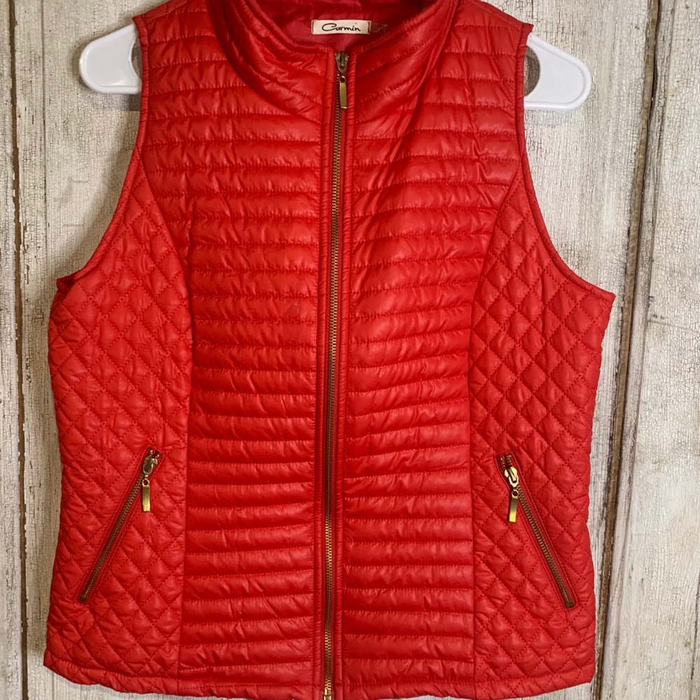 Red puff vest with gold zippers